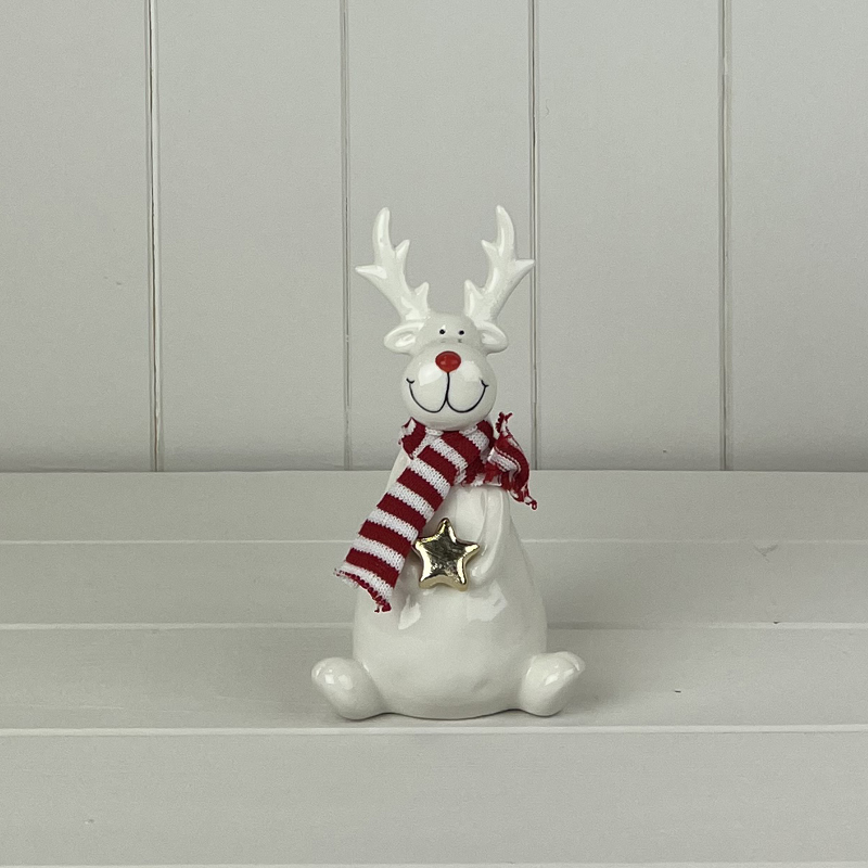 Medium White Sitting Ceramic Reindeer Ornament with Knitted Scarf and Star detail page